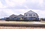 CSX 7662 & 7586 pass the Emerson Shops